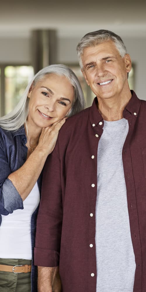 Couple reviewing their retirement plan with their adviser