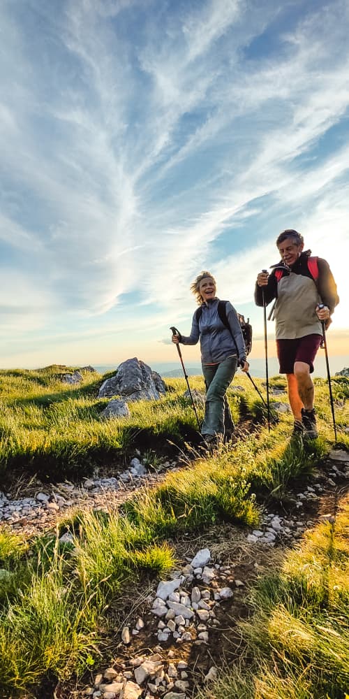 Retired couple walking outdoors